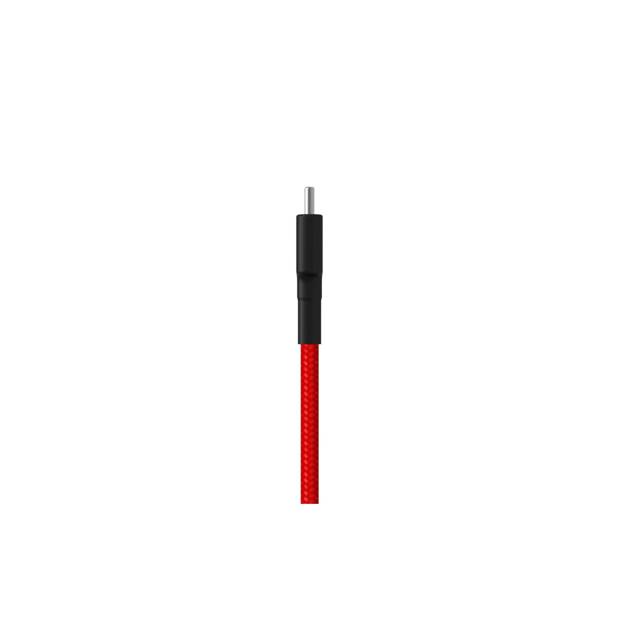 Un câble rouge avec un connecteur noir et une broche argentée.