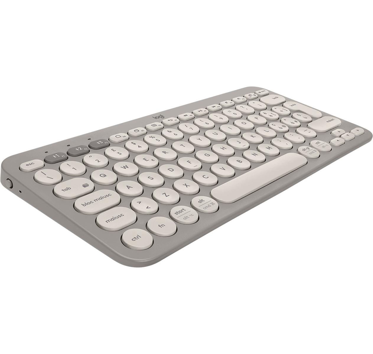 Tastiera Logitech grigia con tasti rotondi color crema su sfondo bianco.