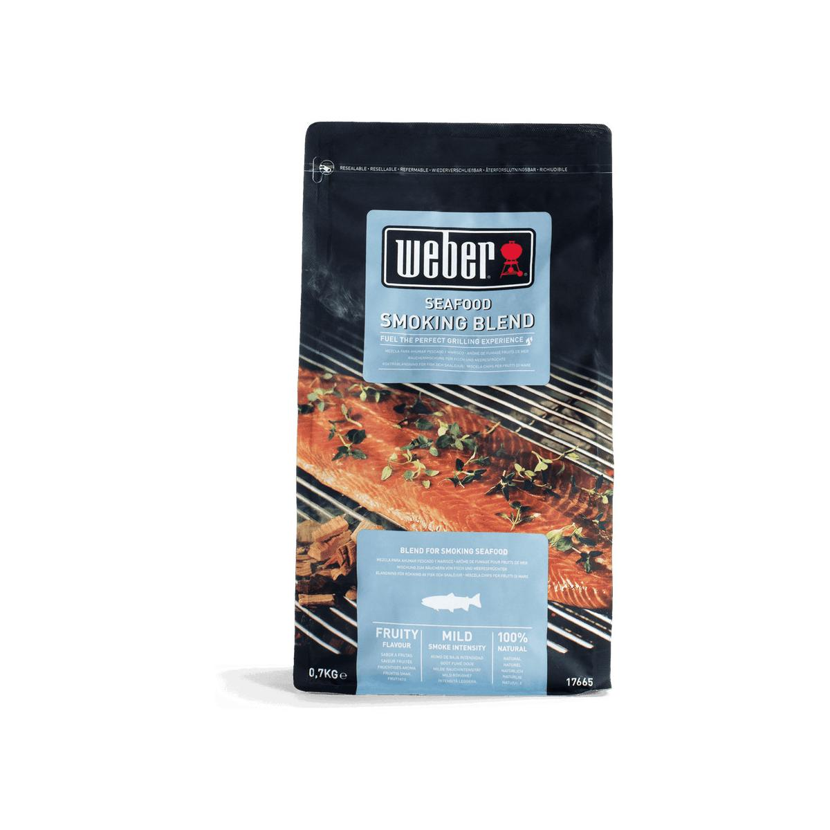 Weber Räucherwerk für Meeresfrüchte mit Lachs auf Grillrost.