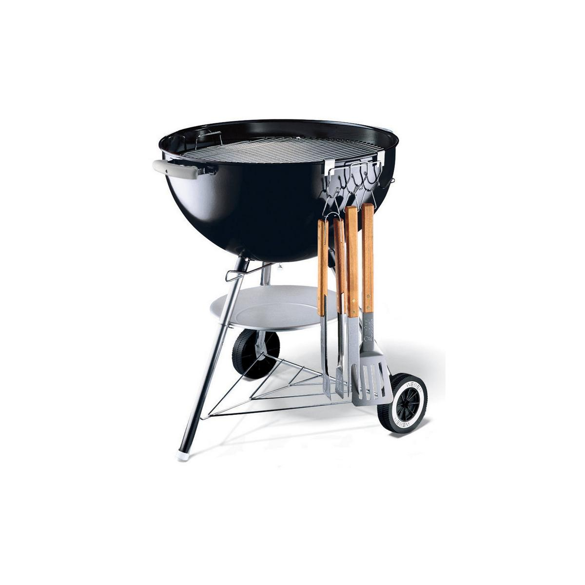 Una parrilla Weber negra con herramientas, sobre ruedas.