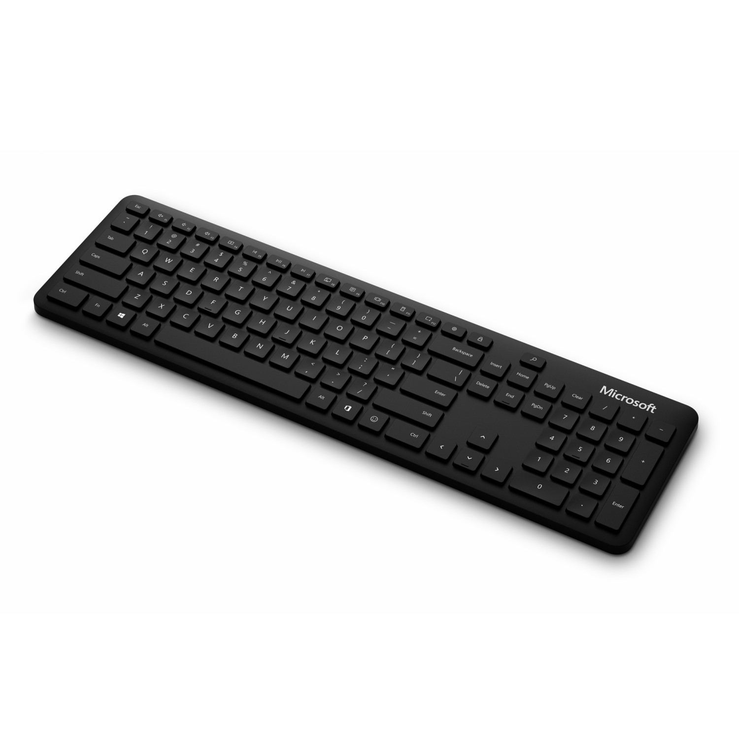 Tastiera Microsoft nera con tastierino numerico su sfondo bianco.