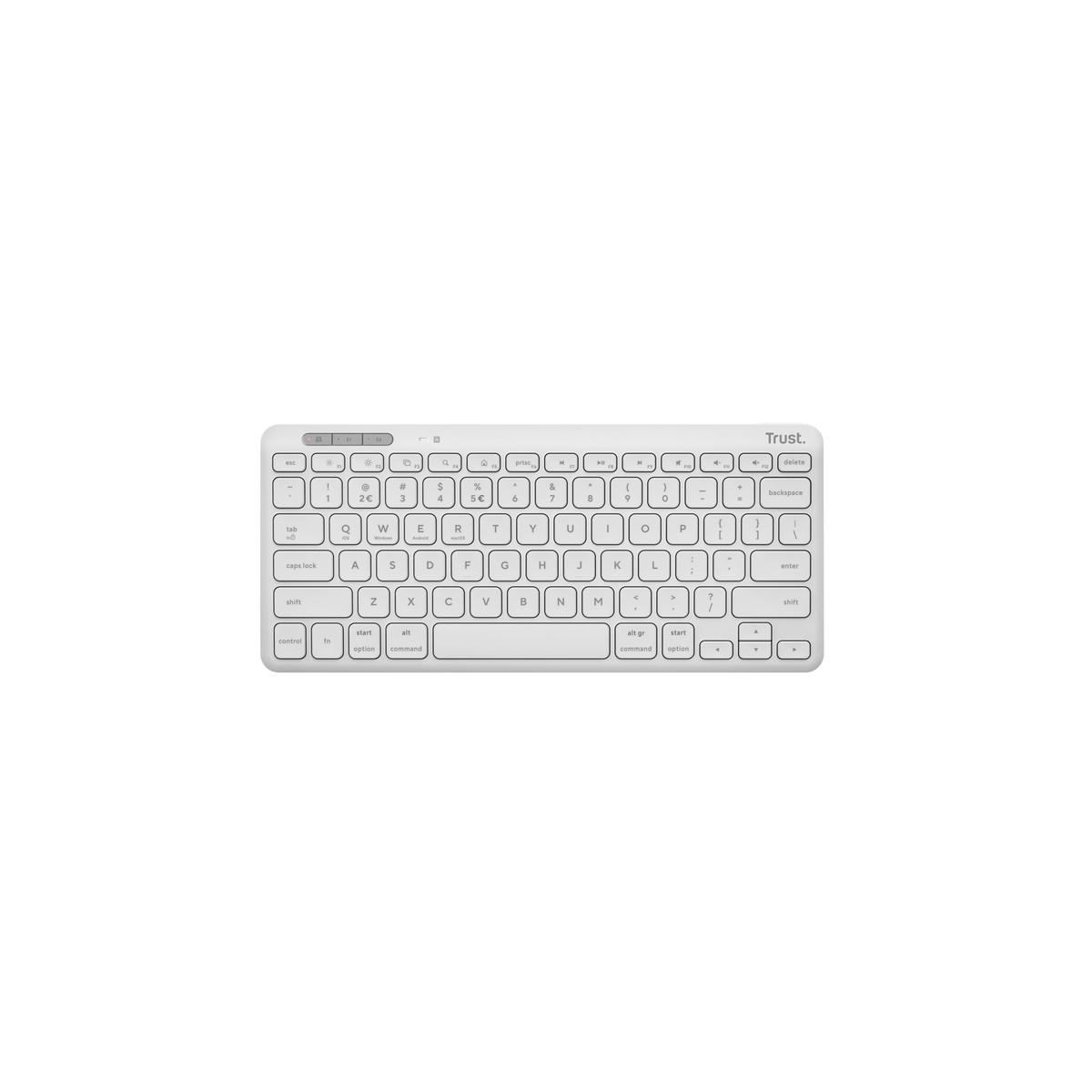 Una tastiera compatta bianca marca Trust con layout QWERTY.