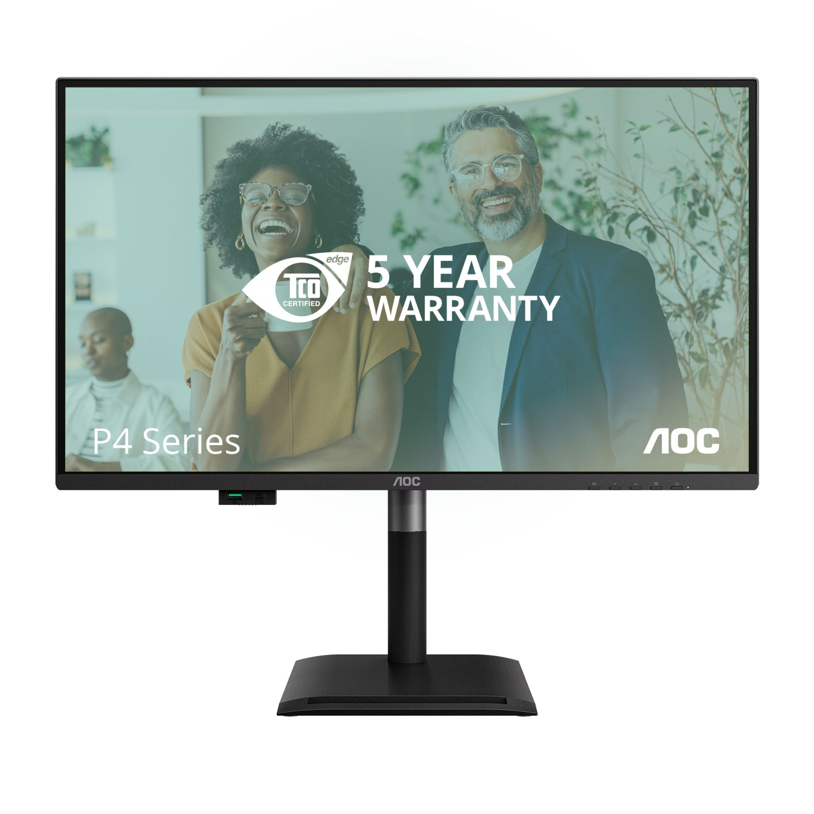 Un uomo e una donna ridono davanti a un monitor con "5 YEAR WARRANTY".