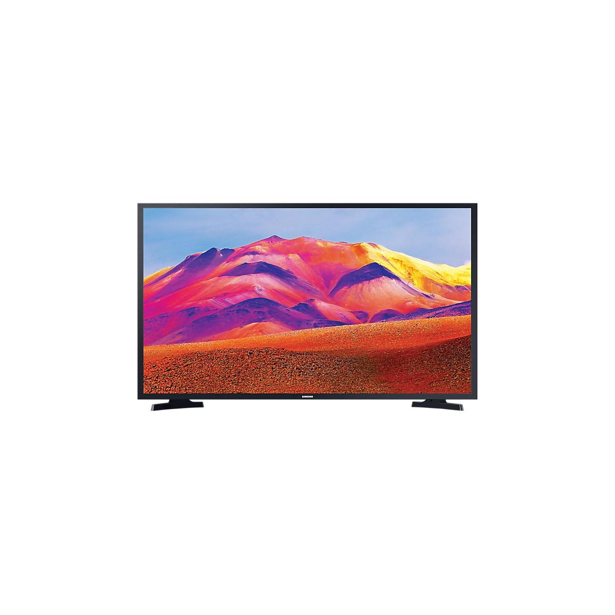 Un televisore nero che mostra un paesaggio montano colorato sotto un cielo blu.