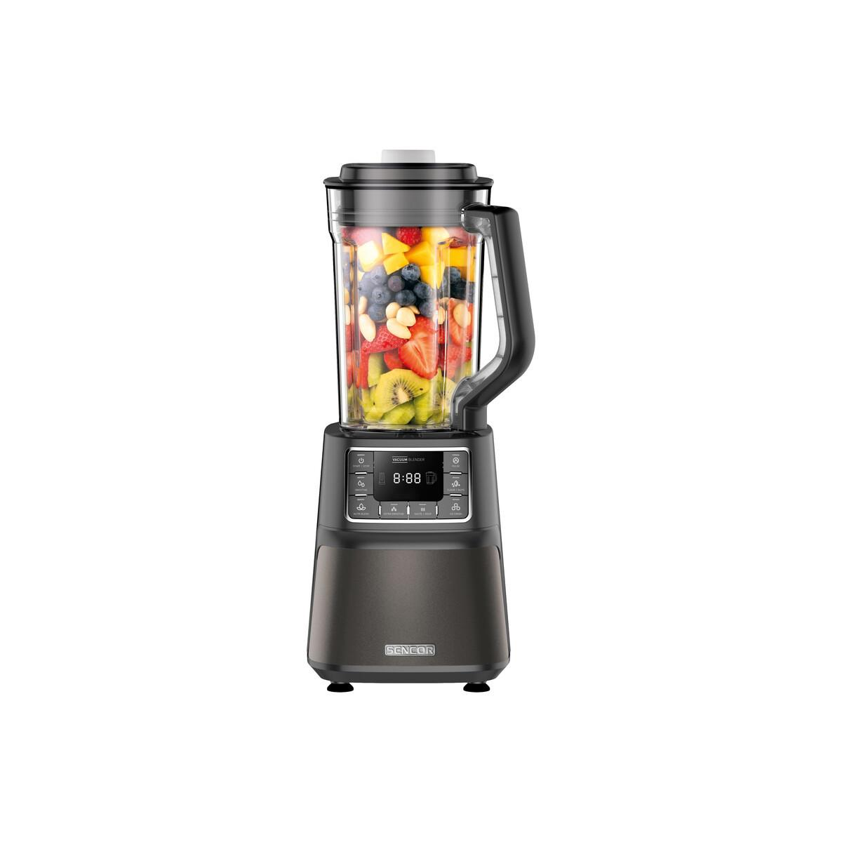 Un frullatore Sencor grigio scuro con una caraffa piena di frutta e bacche colorate.