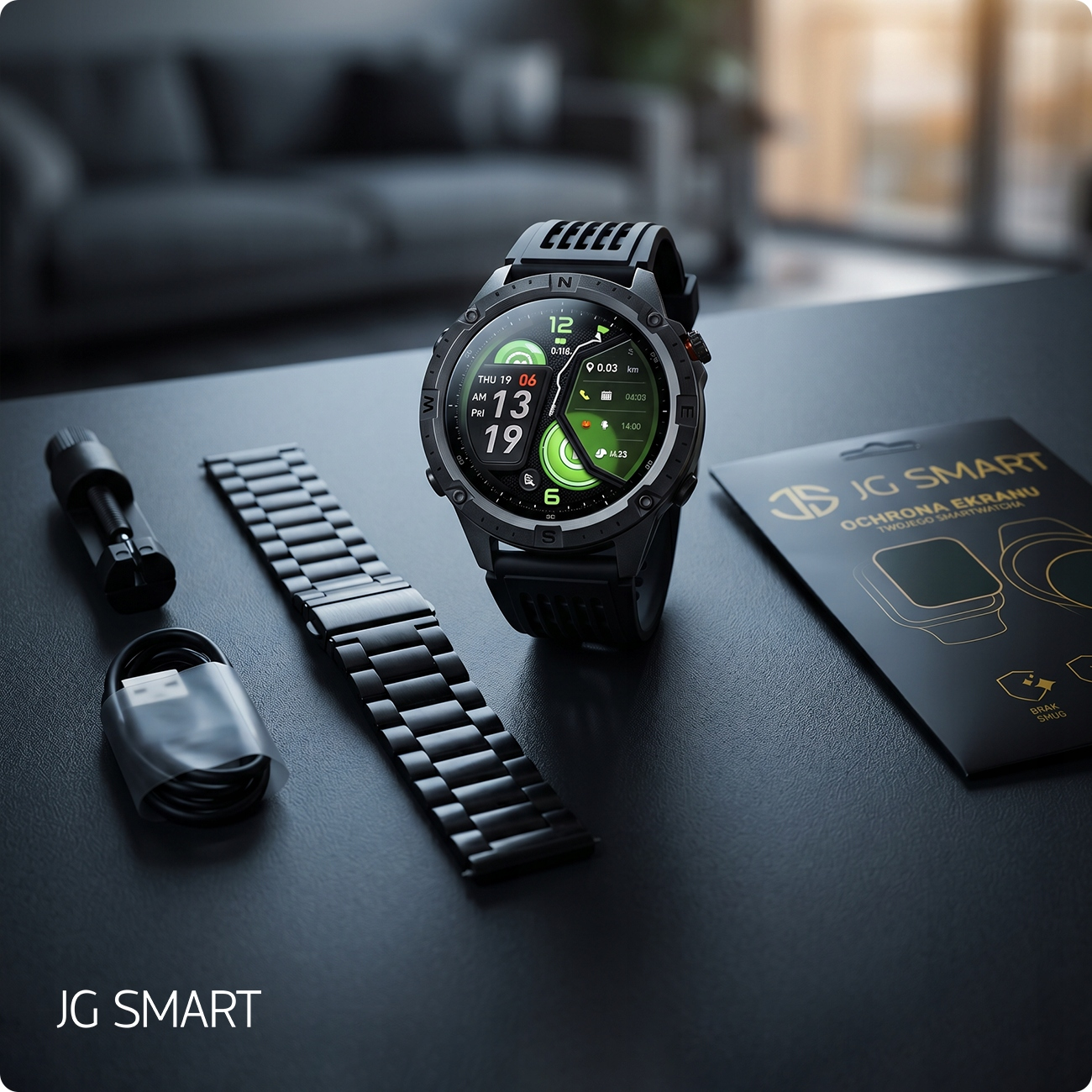 Czarny smartwatch z akcesoriami na stole. Po lewej kabel i bransoleta.