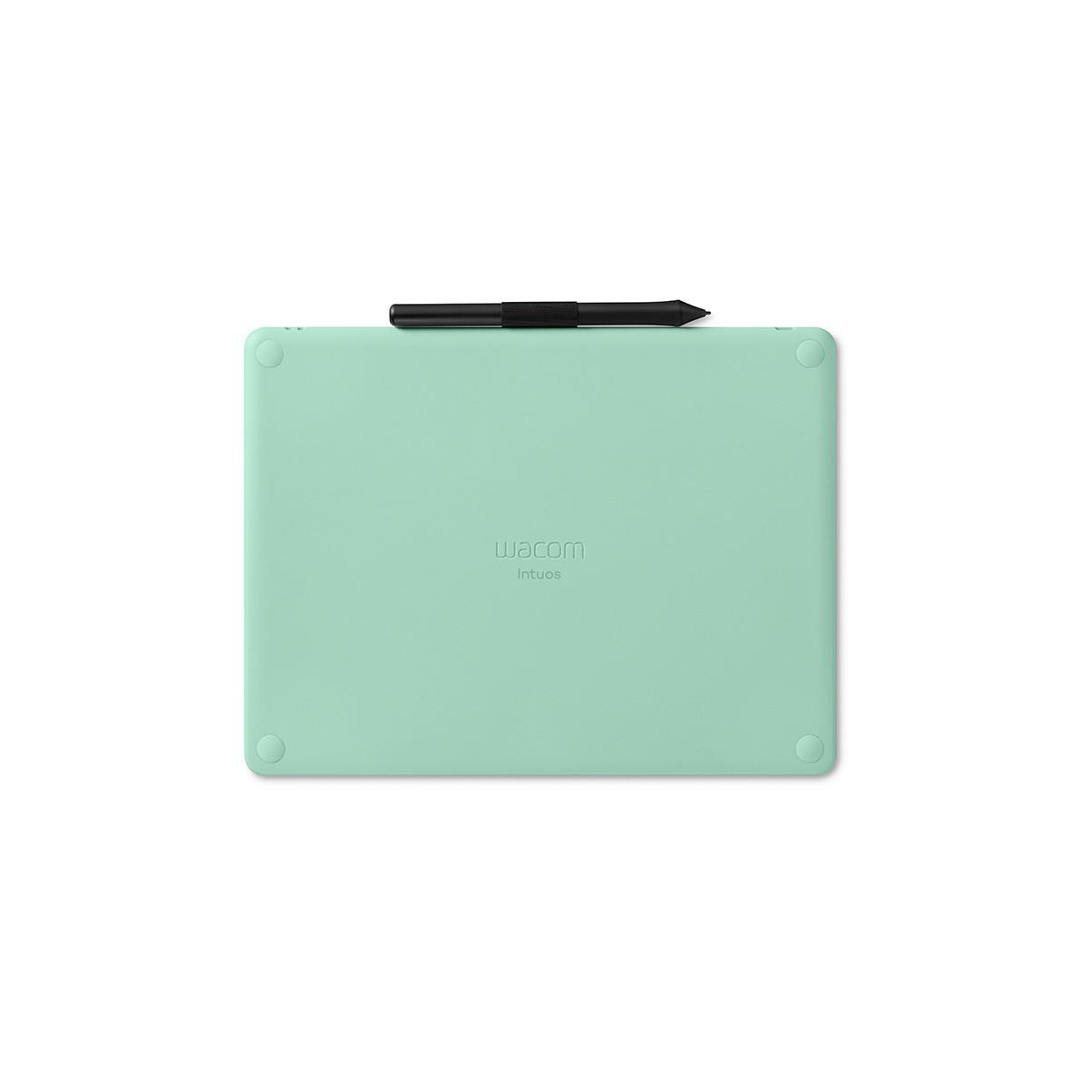 Una tableta gráfica Wacom Intuos verde menta con lápiz sobre fondo blanco.