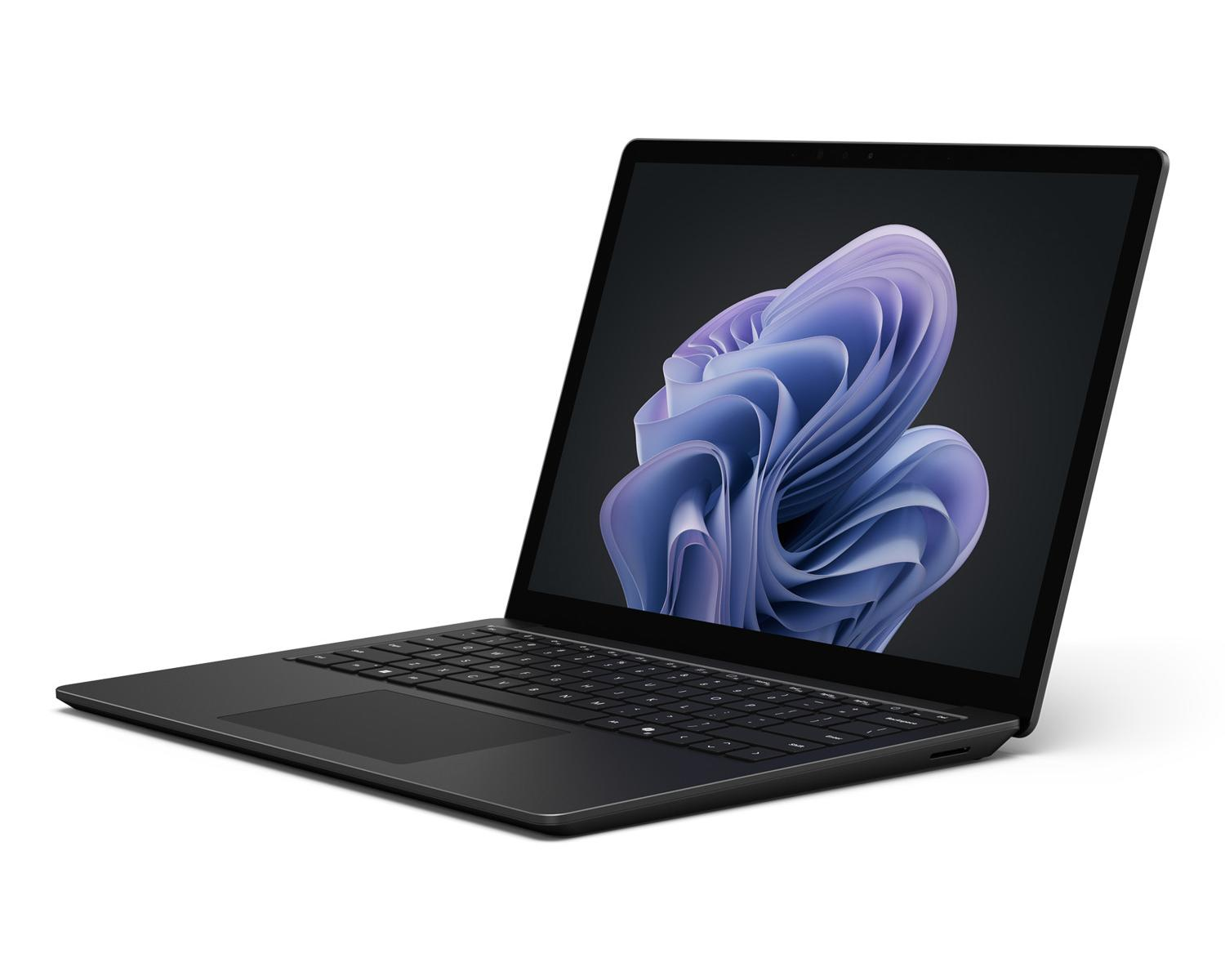 Laptop nero con schermo aperto, che visualizza un'immagine astratta viola.