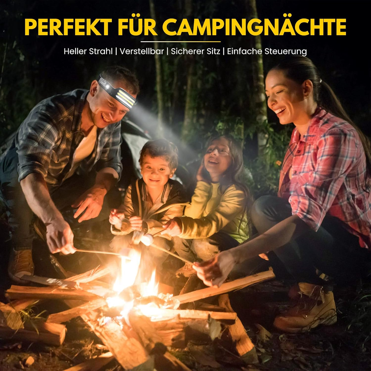 Eine Familie röstet Marshmallows über einem Lagerfeuer, beleuchtet von einer Stirnlampe.