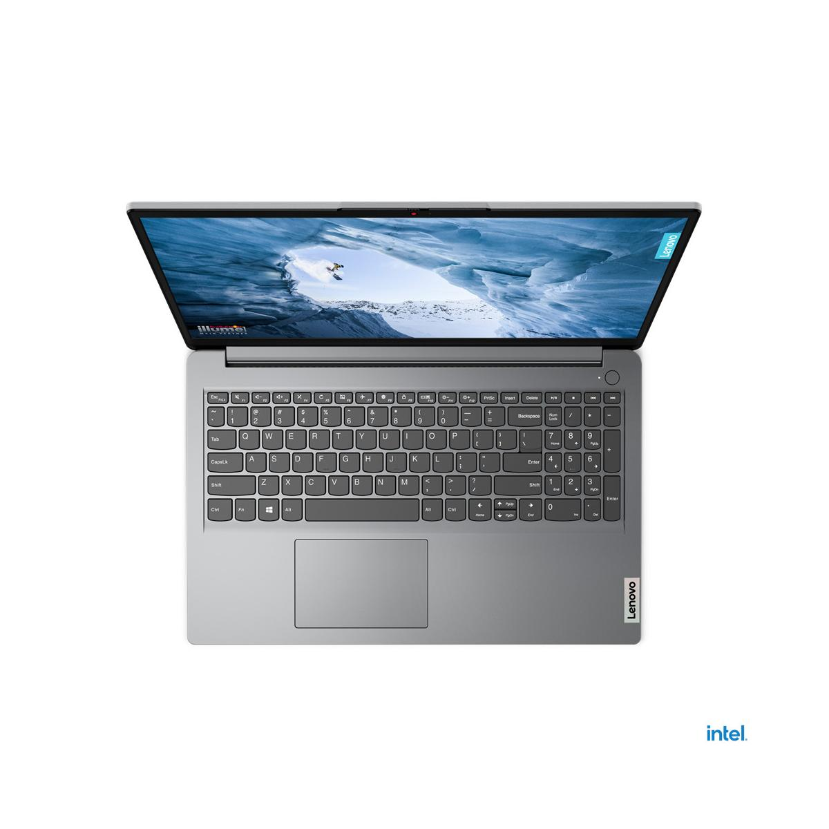 Un laptop Lenovo argento è aperto, mostra uno sfondo panoramico. Tastiera e trackpad visibili.