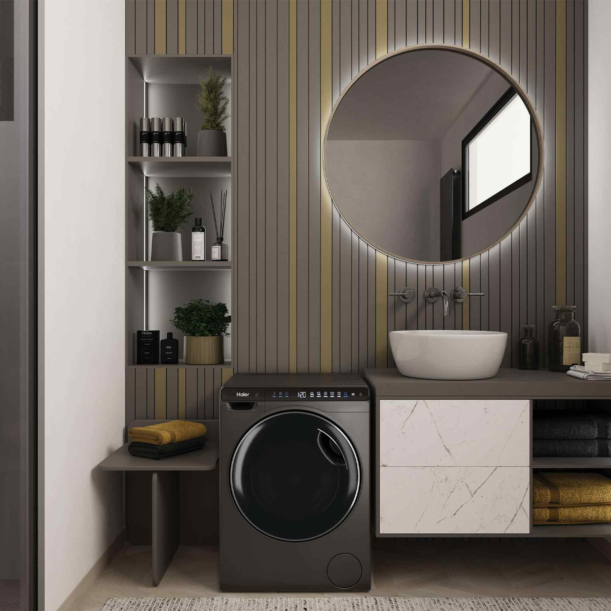 Ein modernes Badezimmer mit Waschmaschine, Waschbecken und Spiegel.