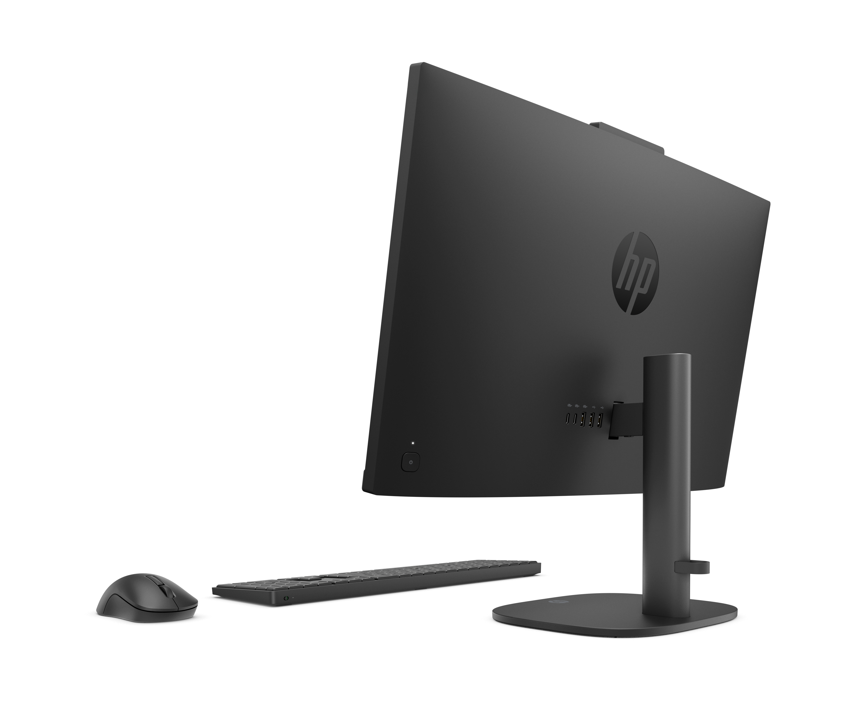Zwarte HP all-in-one computer met muis en toetsenbord, van achteren gezien.