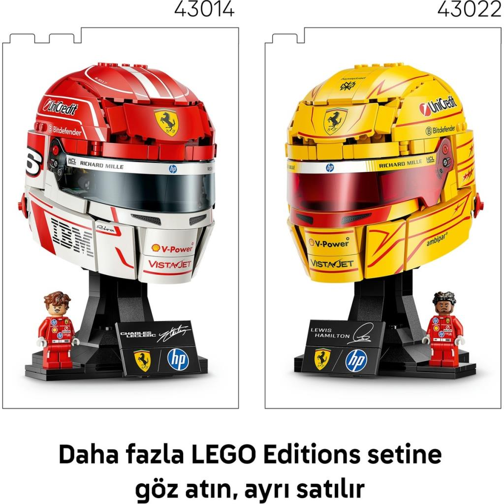 İki LEGO Formula 1 kaskı, kırmızı ve sarı, sürücü figürleri ve stantları.