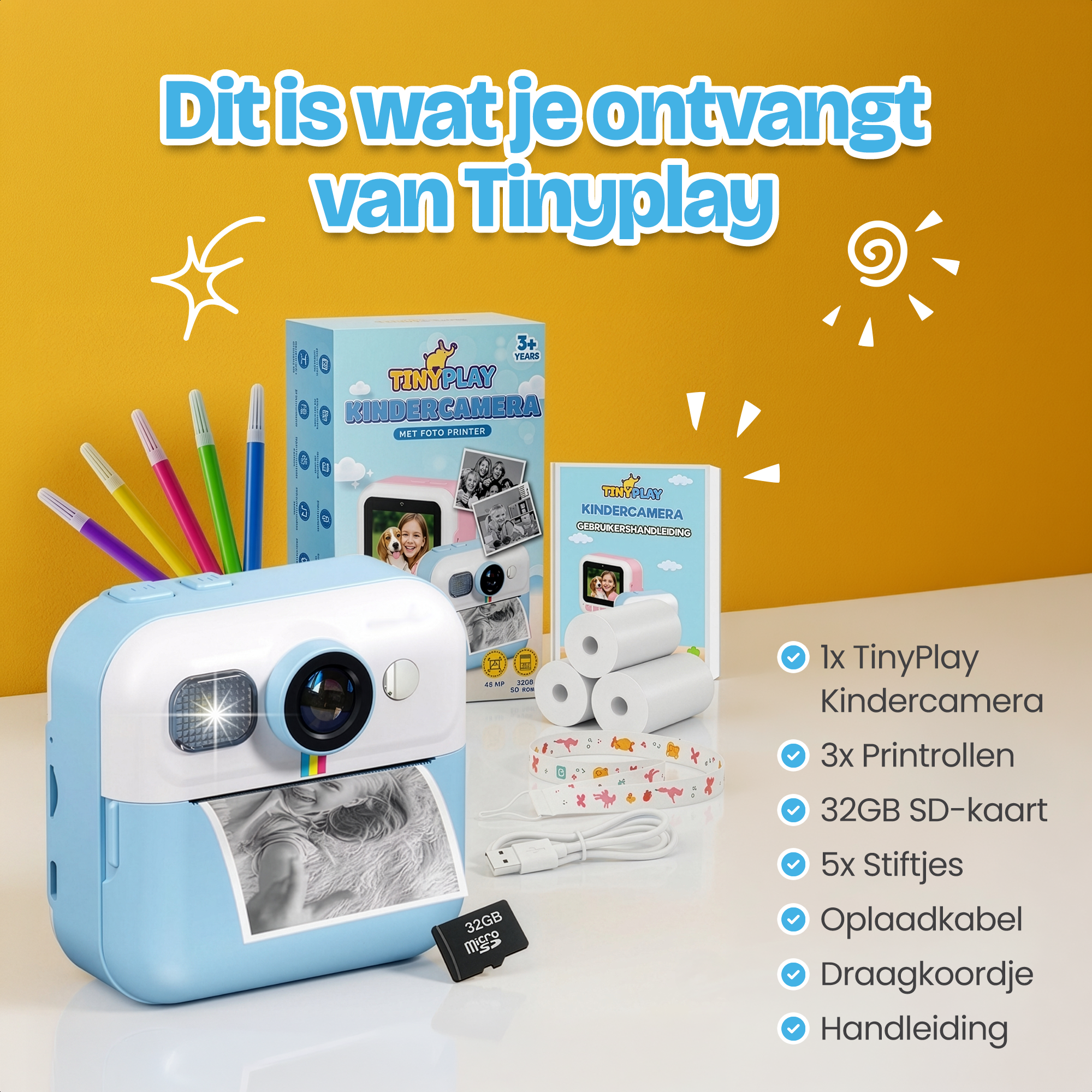 Een blauw-witte kinder camera met printfunctie, stiften, rollen en kabel.