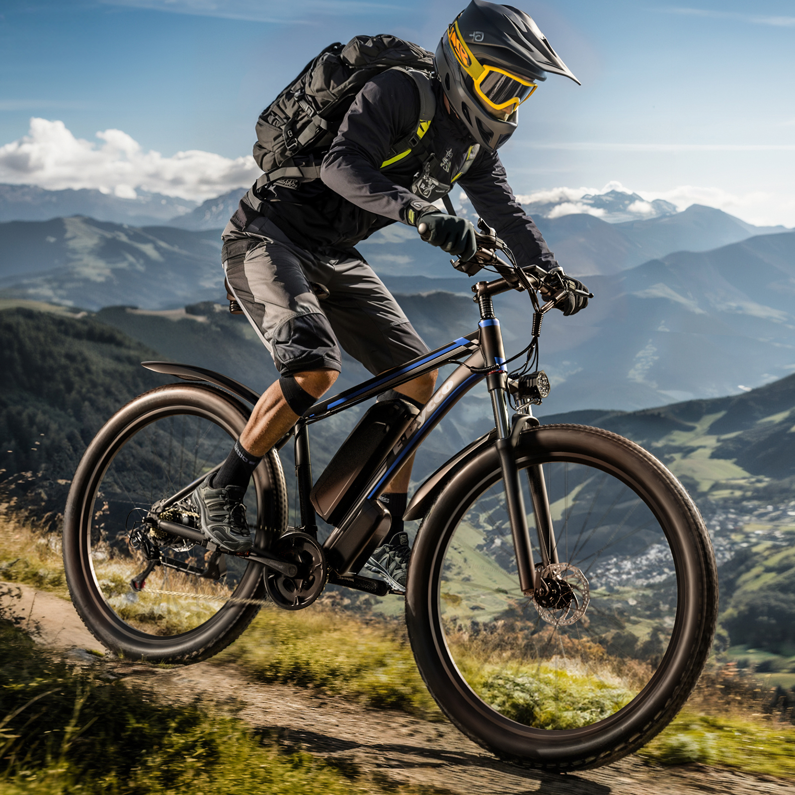 Un hombre monta una e-bike por un sendero de montaña con laderas boscosas.