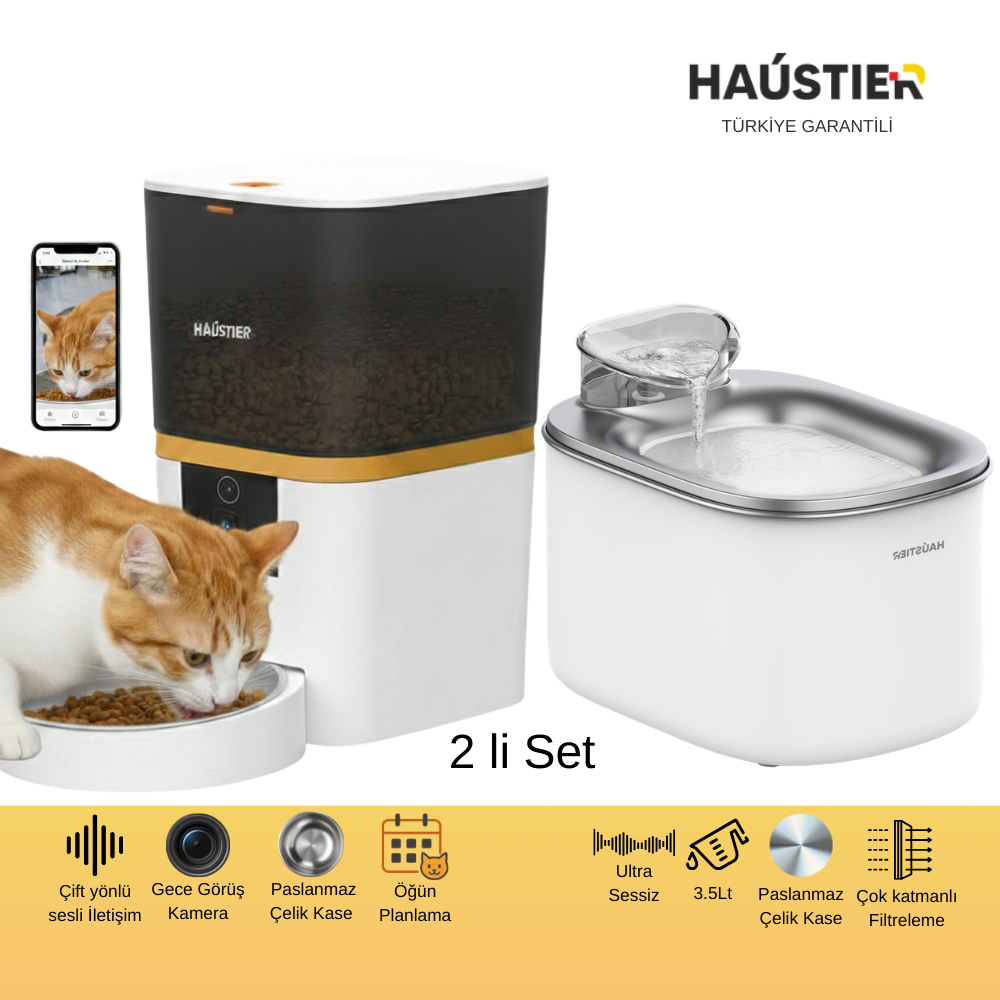 Turuncu-beyaz bir kedi, mama otomatı ve su sebilesinin yanında mama yiyor.