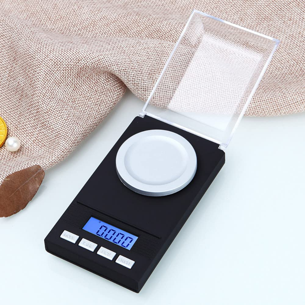 Schwarze Digitalwaage mit klarem Deckel, Anzeige auf Null.