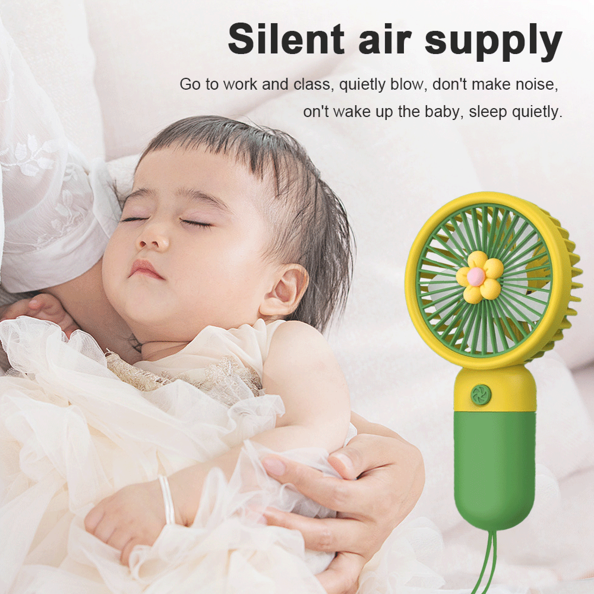 Ein schlafendes Baby neben einem kleinen gelben und grünen Ventilator.