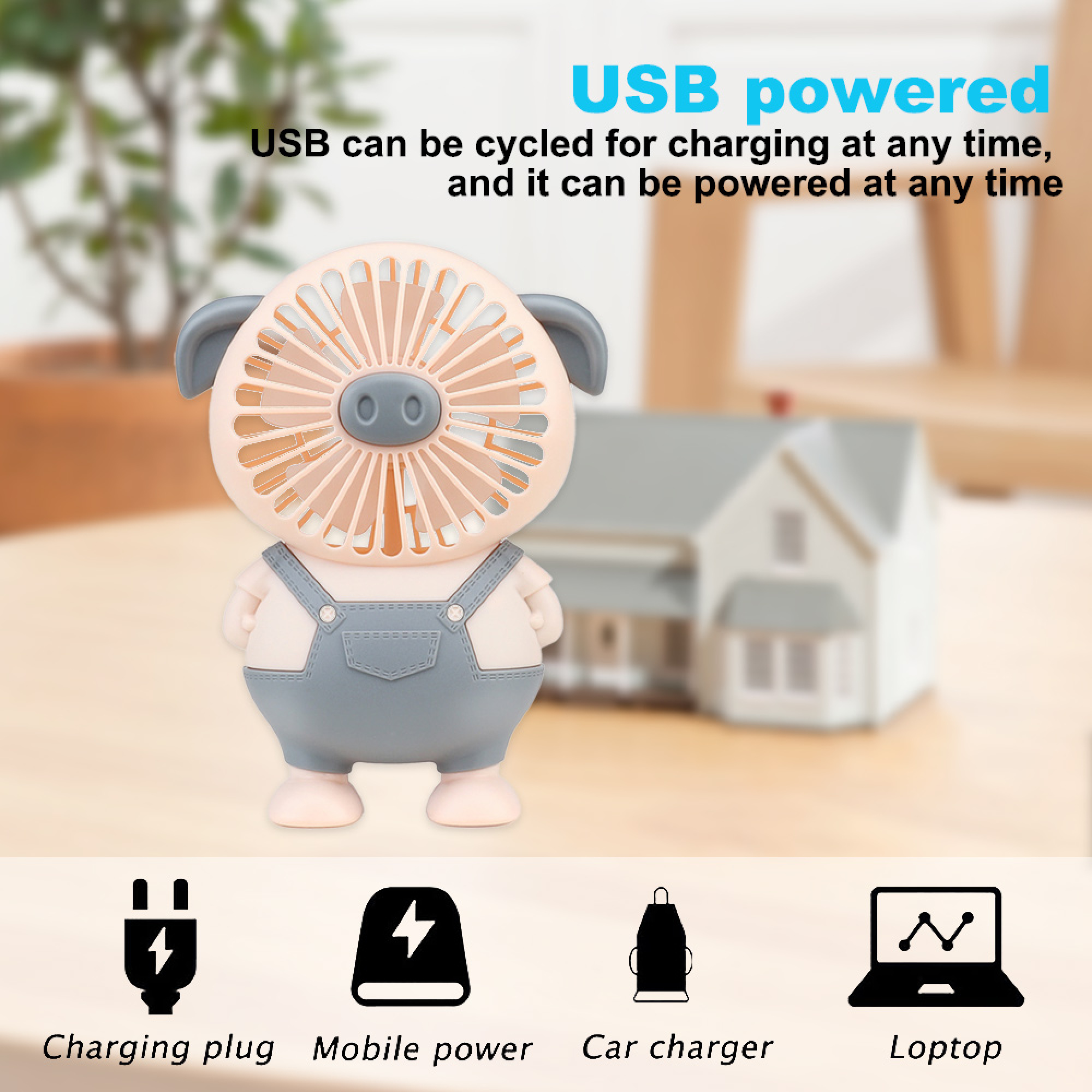 Ein schwein-förmiger USB-Ventilator steht auf einem Tisch, mit Symbolen für Ladeoptionen.