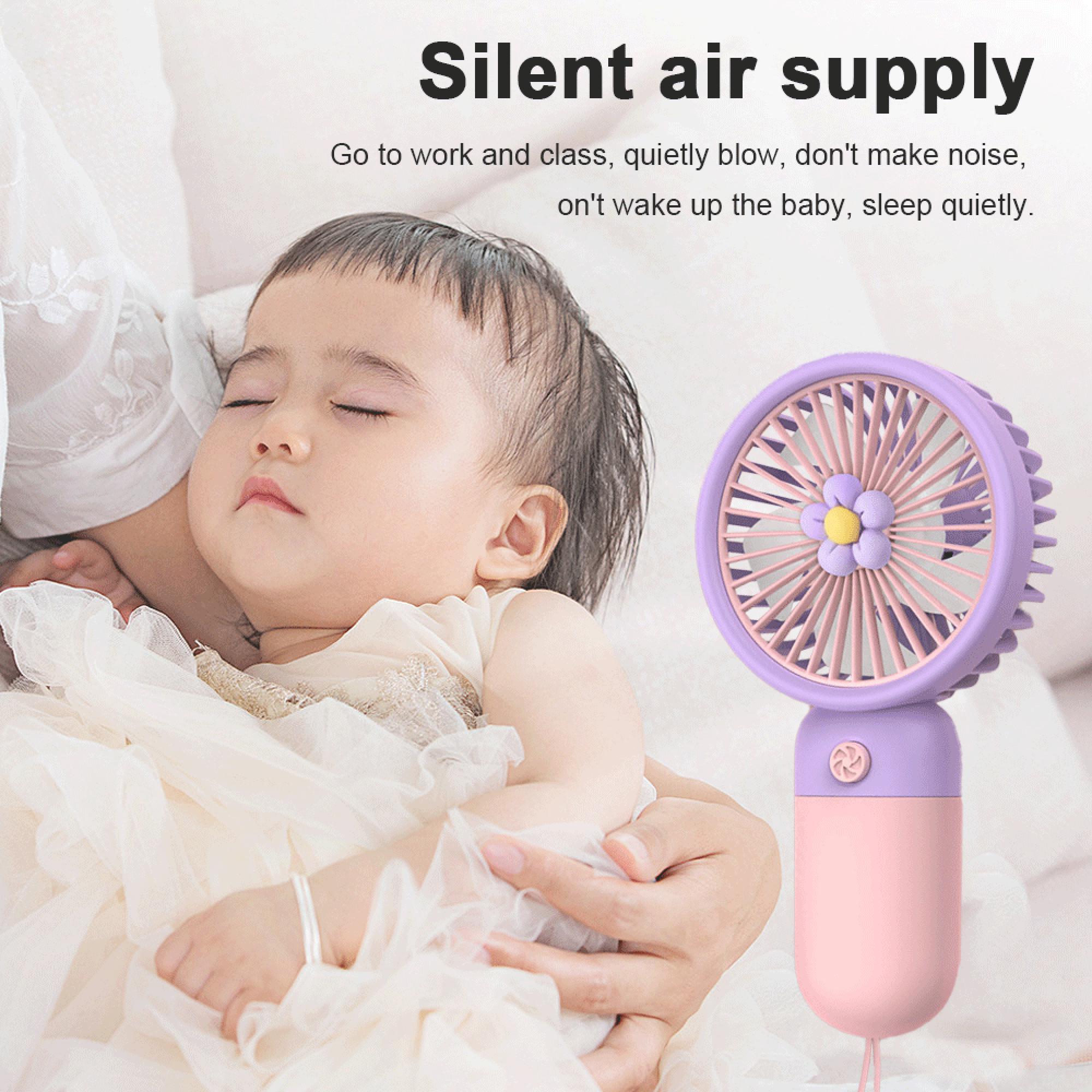 Ein schlafendes Baby wird von Händen gehalten, ein kleiner rosa-violetter Ventilator in der Nähe.
