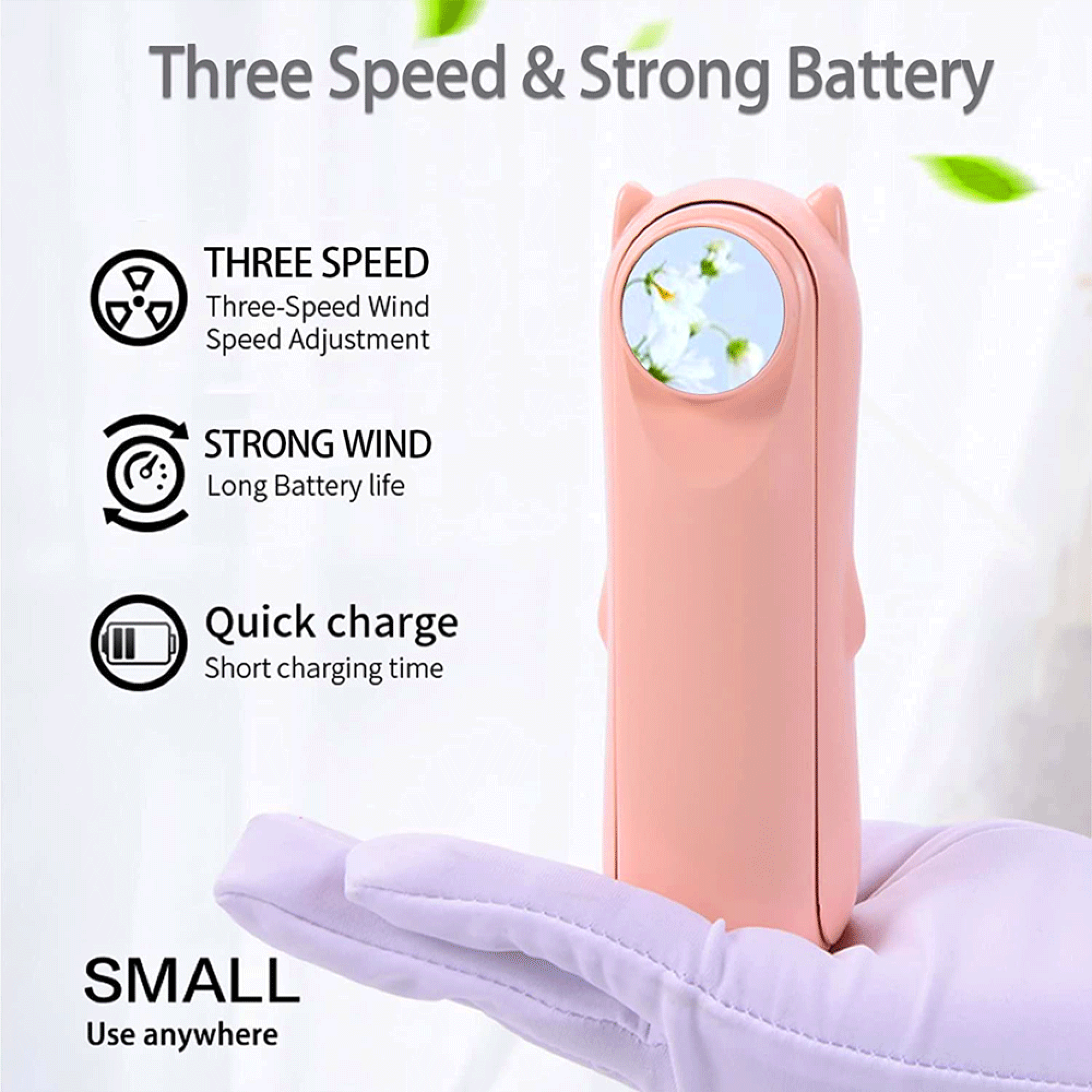 Pinker Handventilator mit Blumenmuster, gehalten von einer behandschuhten Hand. Merkmale: 3 Geschwindigkeiten, starker Akku, Schnellladung.