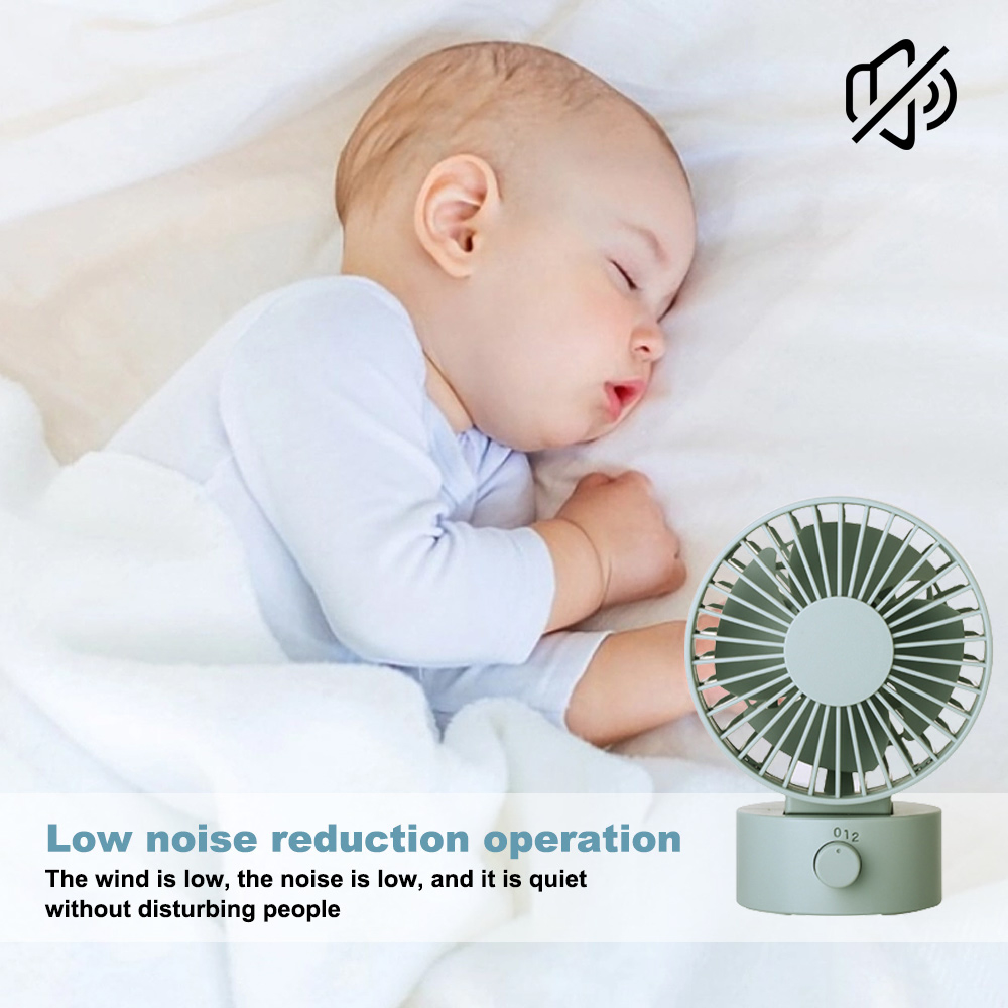 Ein Baby schläft neben einem kleinen, grauen Ventilator mit geringer Geräuschentwicklung.