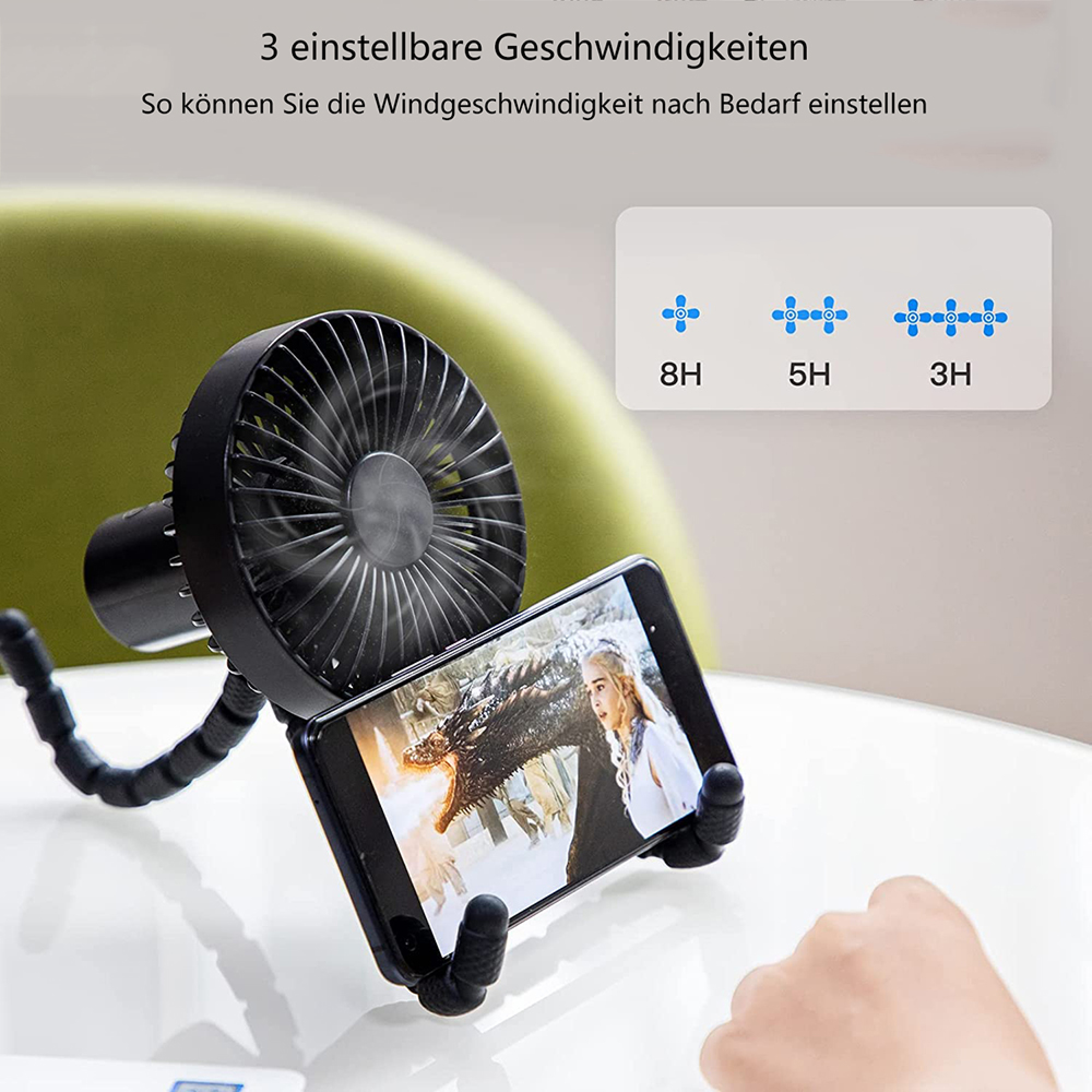 Ein schwarzer Ventilator hält ein Smartphone mit einer Drachenszene, 3 Geschwindigkeiten.