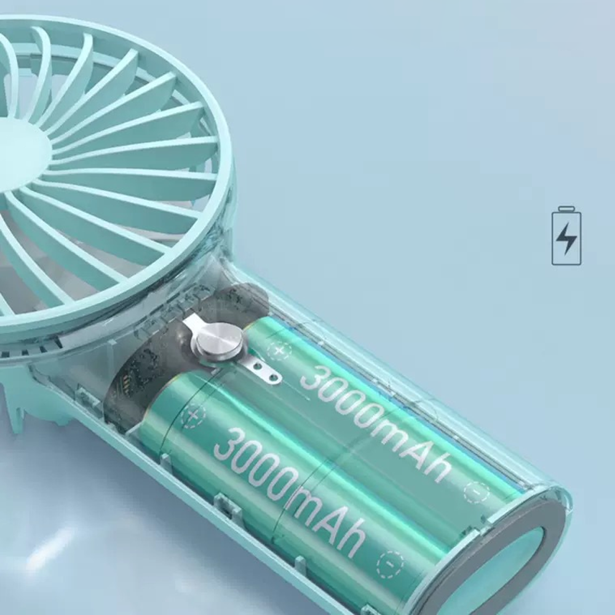 Ein türkisfarbener Handventilator mit durchsichtigem Gehäuse, der zwei 3000-mAh-Batterien zeigt.