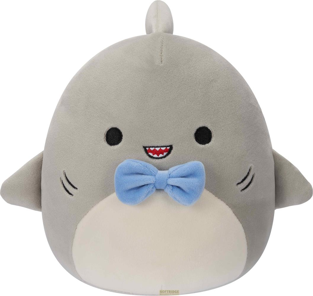 Un peluche squalo grigio con papillon blu e sorriso disegnato.