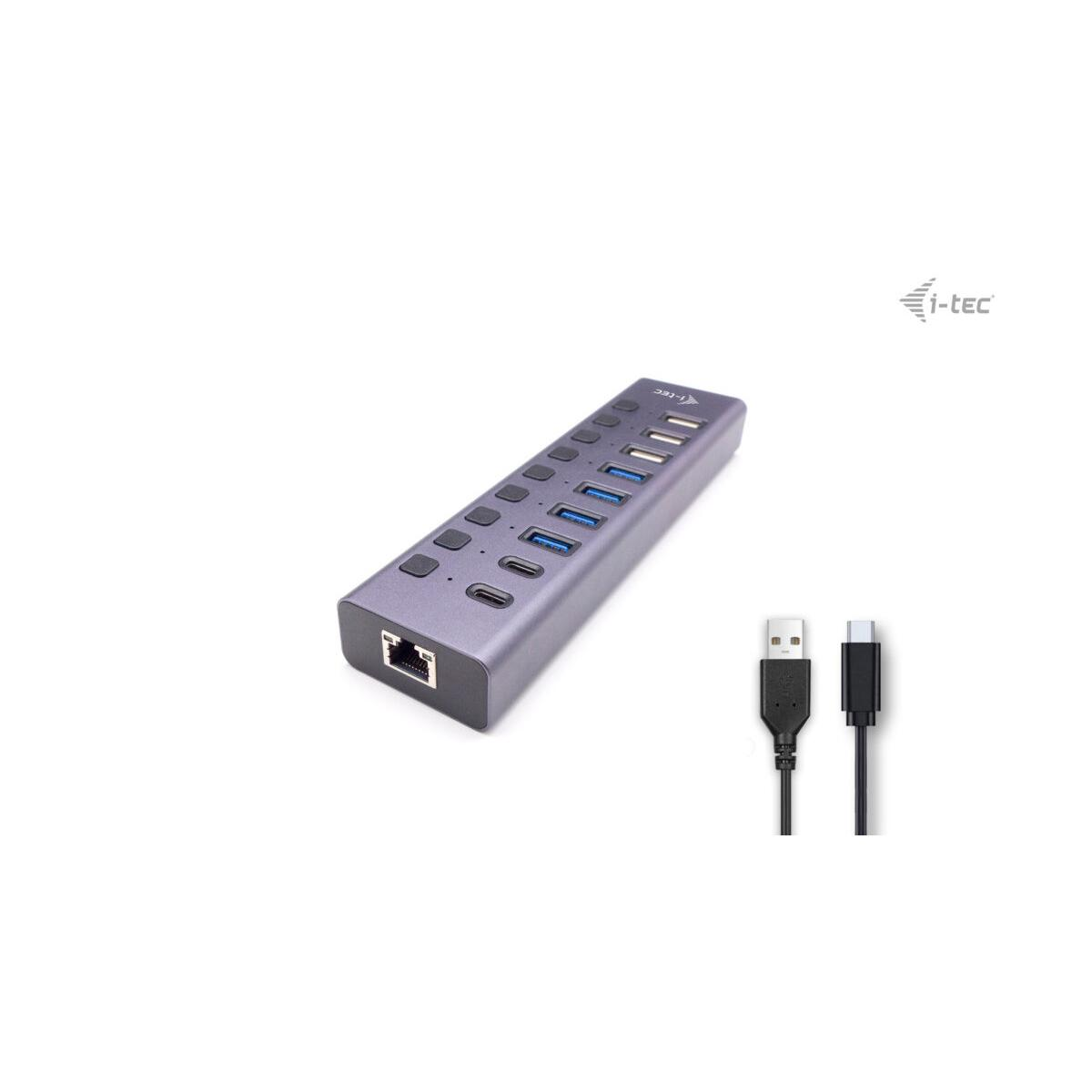Hub USB-C grigio con più porte e due cavi.