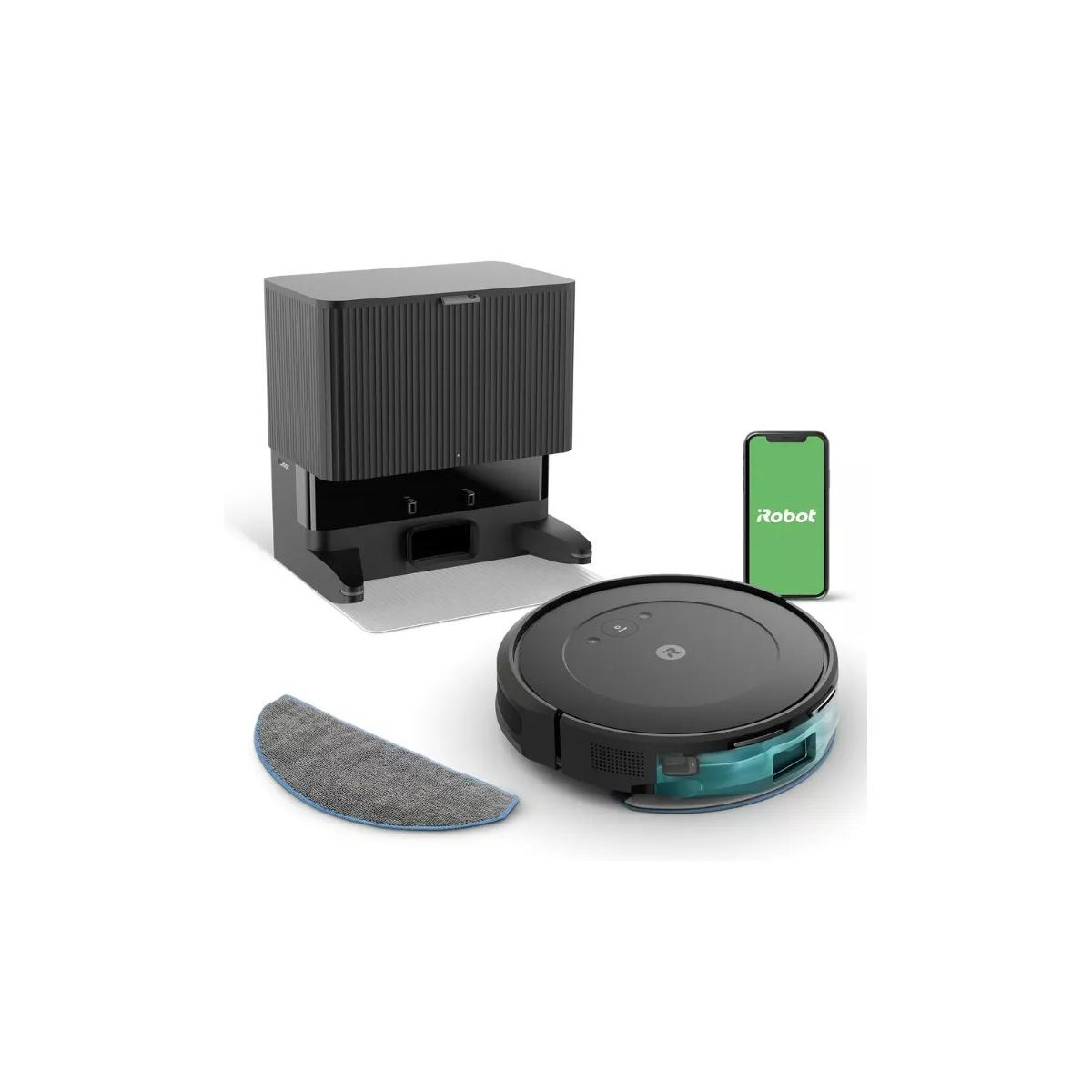 Black robot vacuum with dock, phone, and mop pad on a white background.