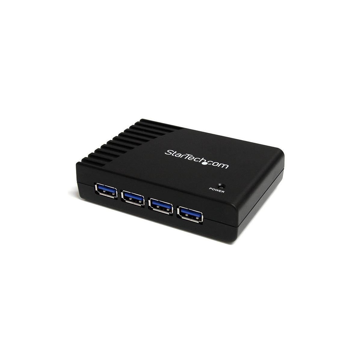 Hub USB noir à quatre ports avec LED d'alimentation sur fond blanc.