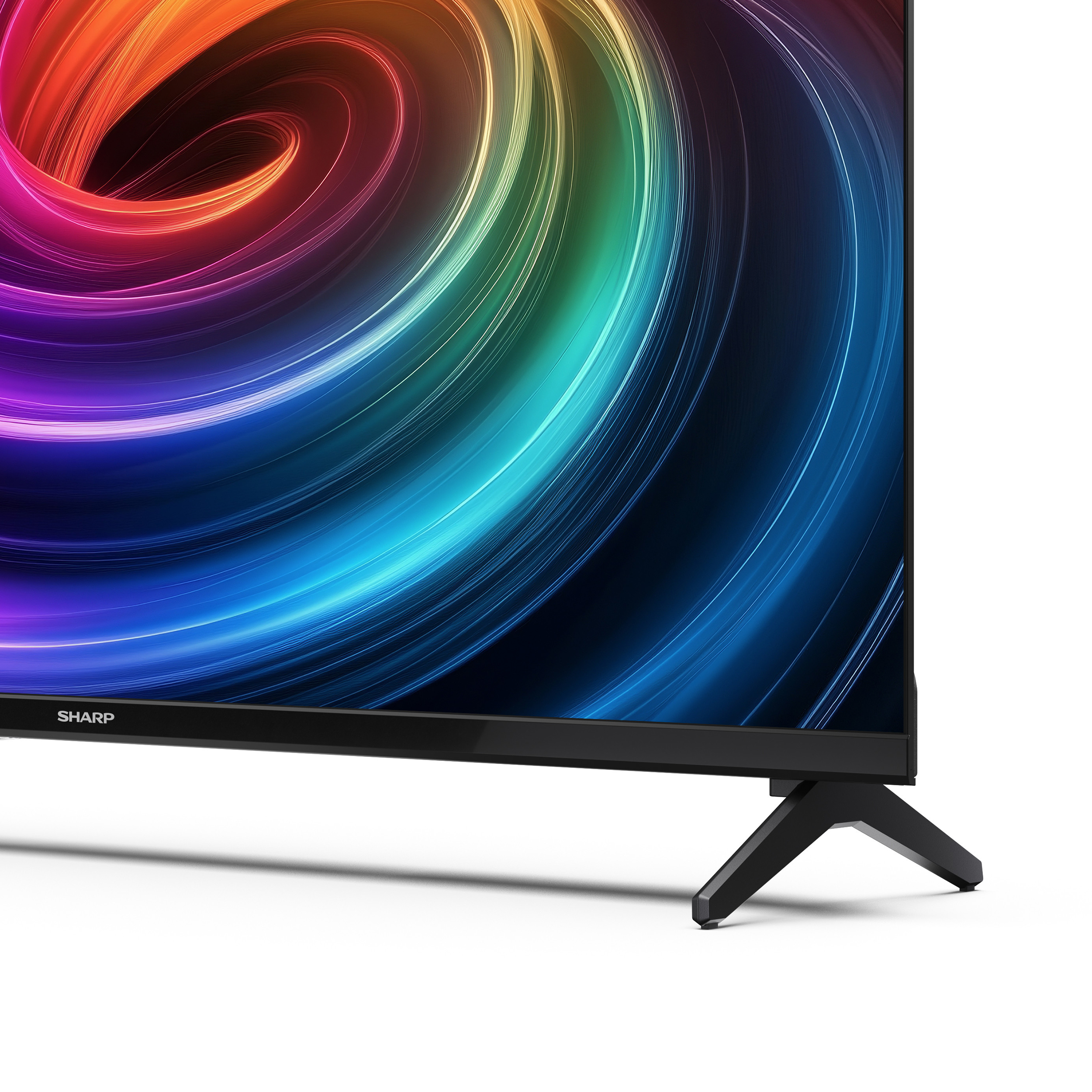Ein Sharp-Fernseher mit einem lebendigen, wirbelnden Farbmuster auf dem Bildschirm.