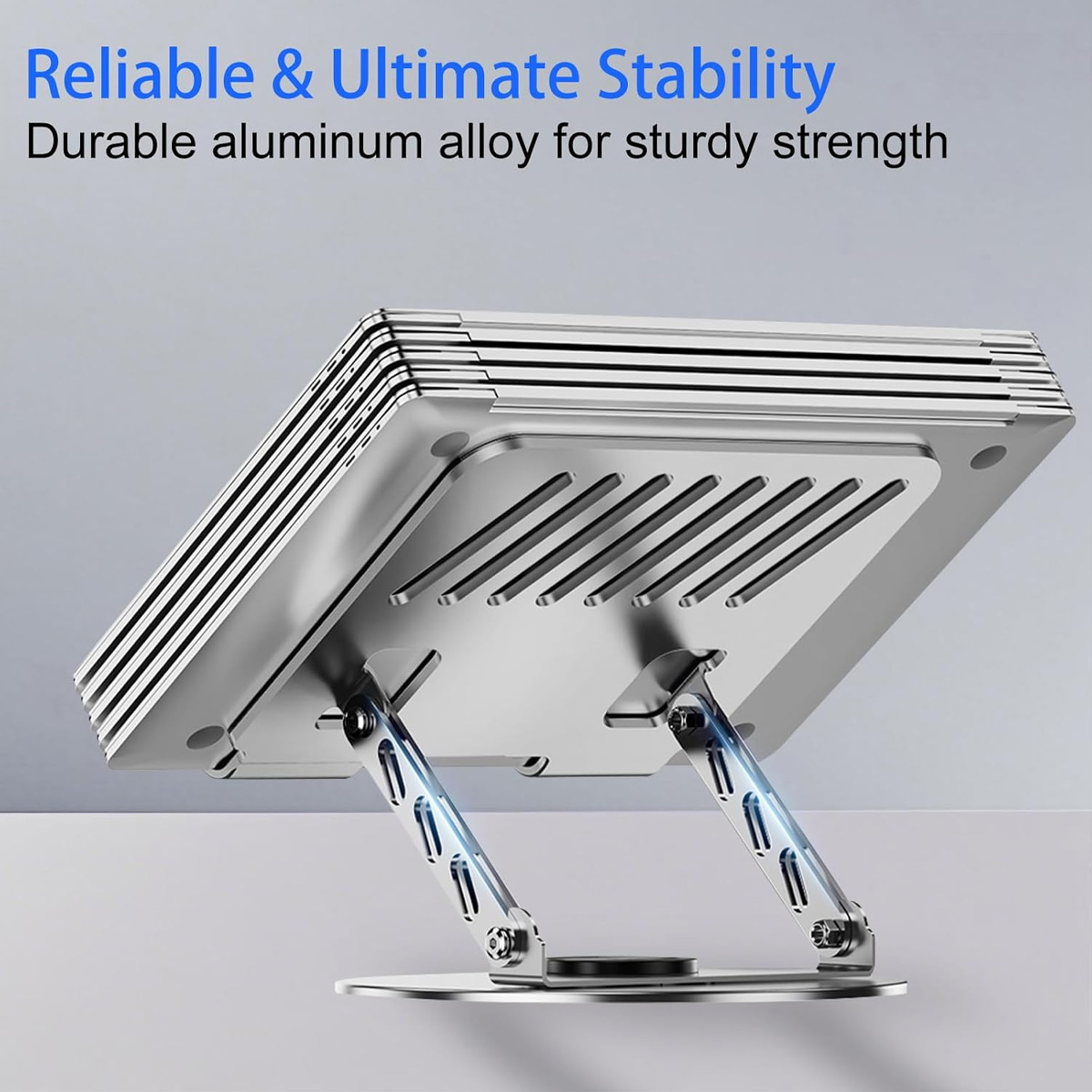 Ein silberner Laptop-Ständer aus Aluminiumlegierung mit verstellbaren Armen.