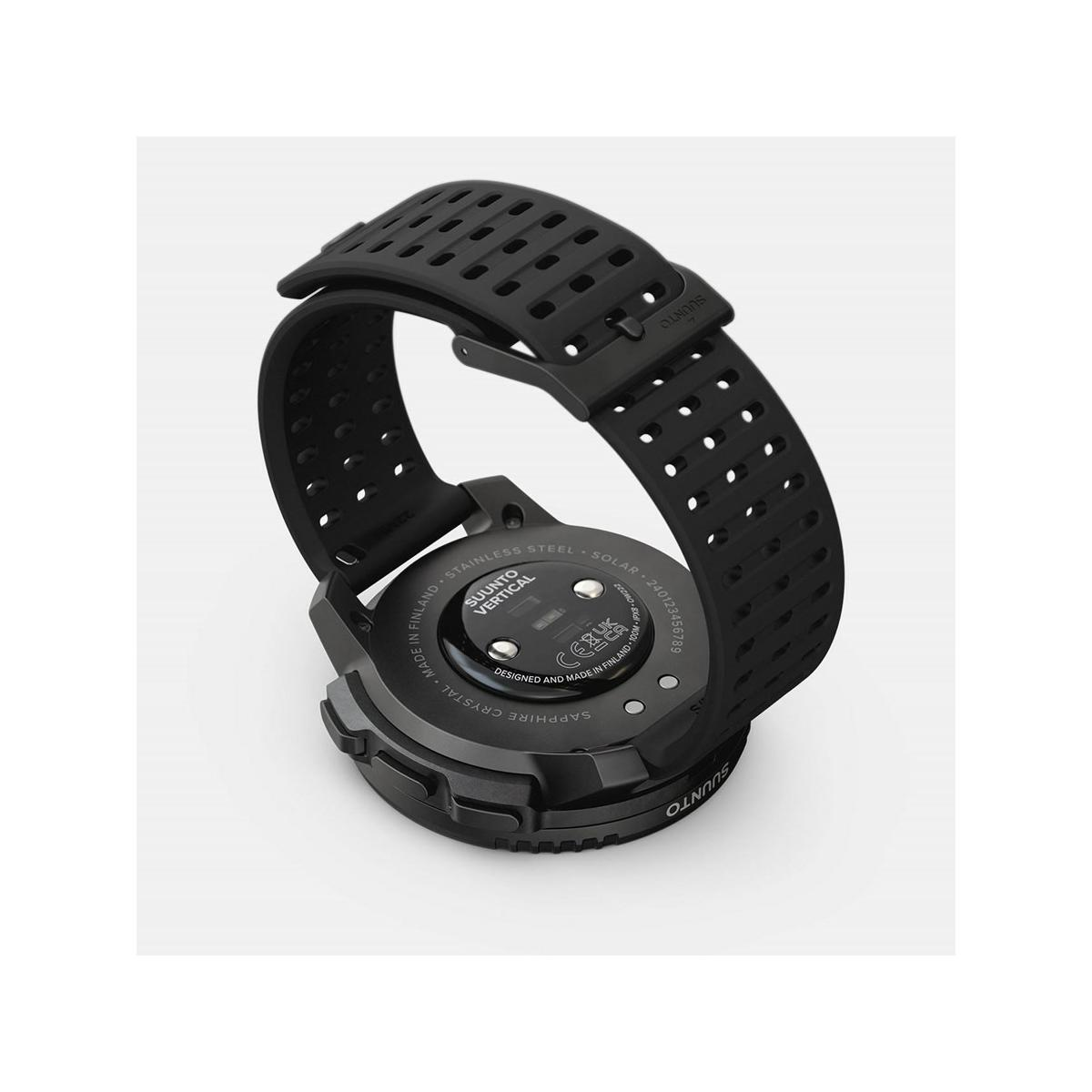 Black Suunto smartwatch with perforated strap, detailed view.