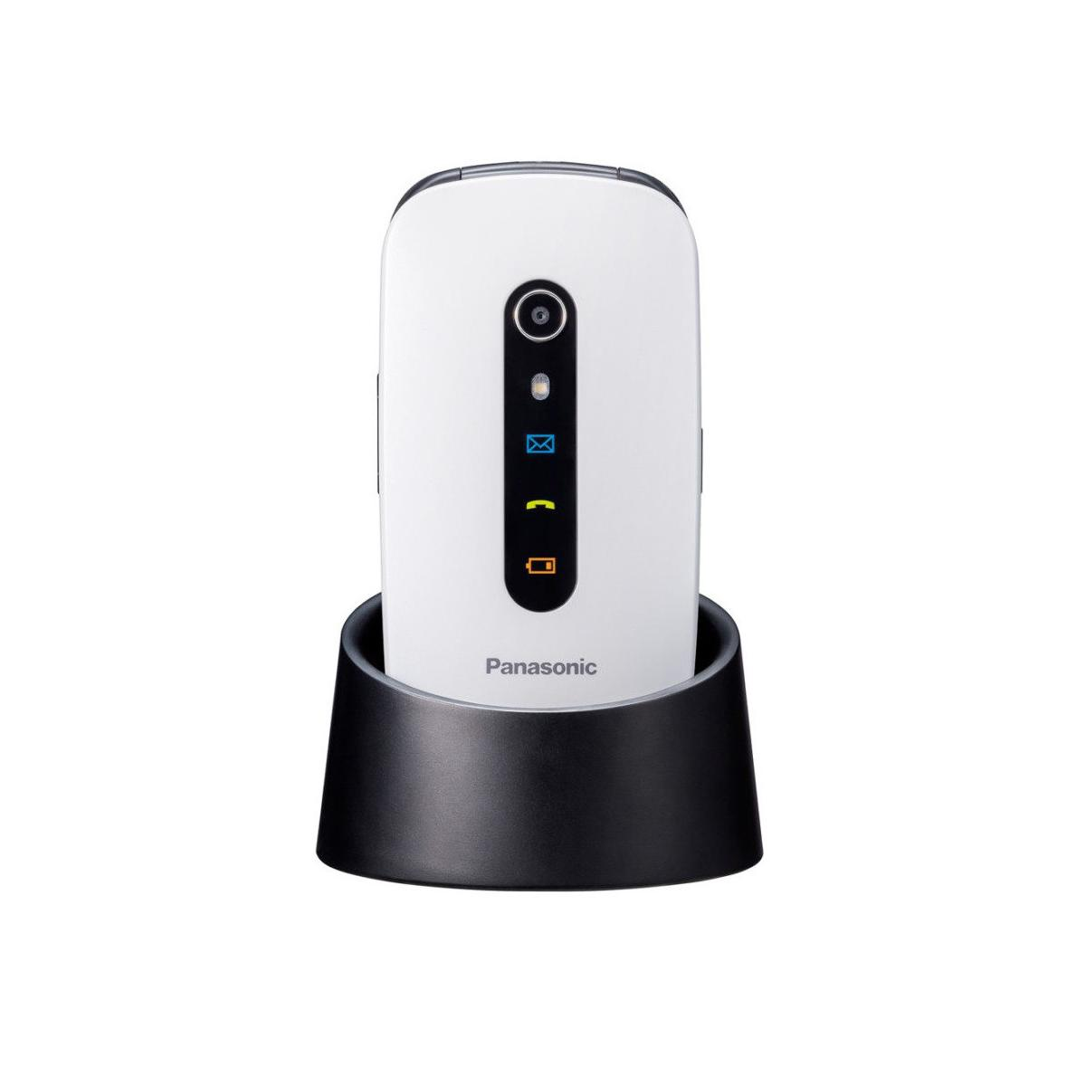 Ein weißes Panasonic-Klapphandy mit Ladeschale. Es hat eine Kamera und Status-LEDs.