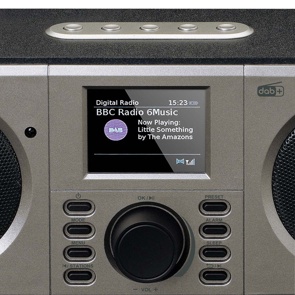 A digital radio displays BBC Radio 6Music, playing 'Little Something'.