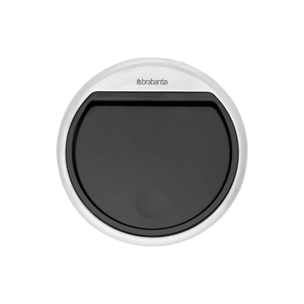 Ronde Brabantia prullenbak met zwarte opening en zilveren rand.