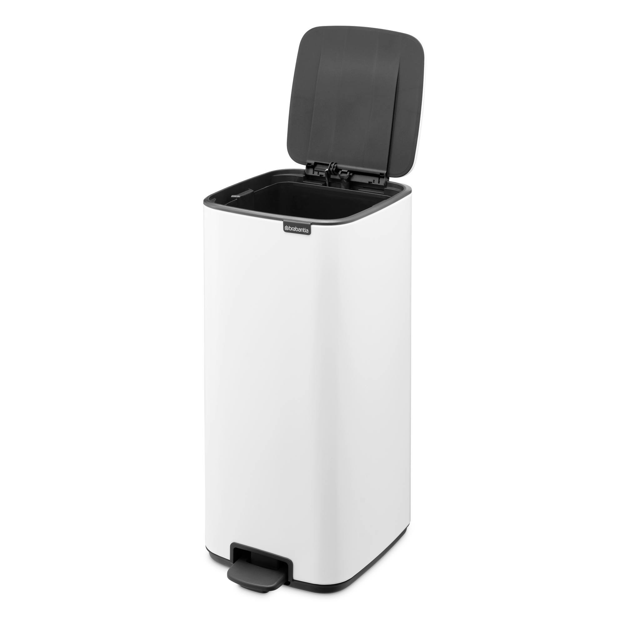 Een witte Brabantia pedaalemmer met het deksel open.