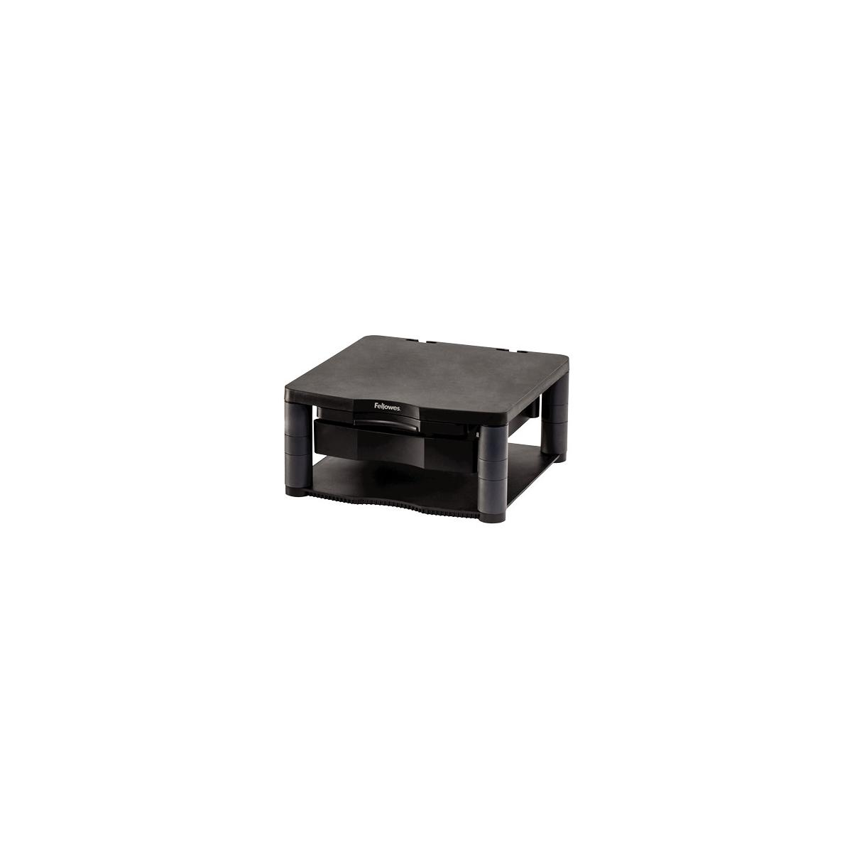 Un soporte negro para monitor con dos cajones está sobre un fondo blanco.