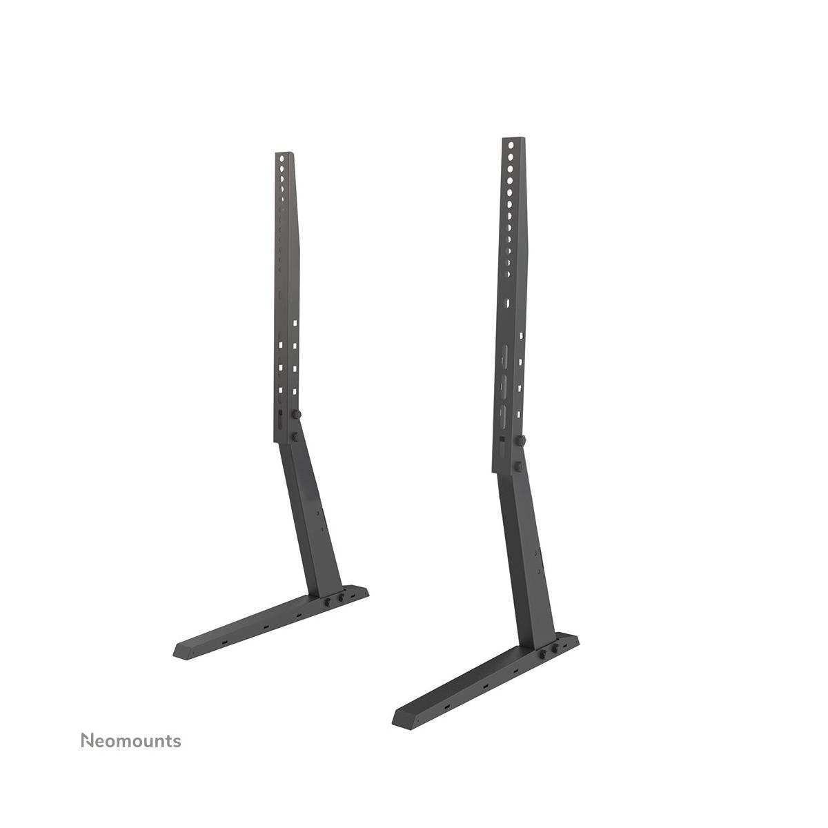 Two dark TV stands with L-shaped bases and adjustable poles.