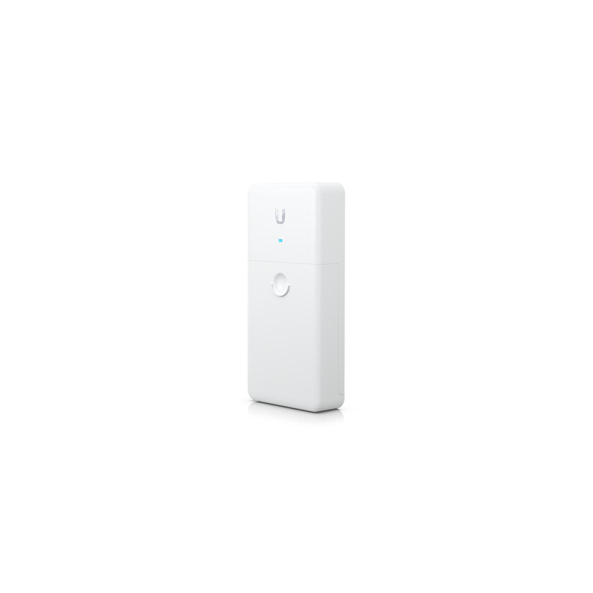 Un appareil Ubiquiti blanc avec une lumière bleue et un cercle sur fond blanc.