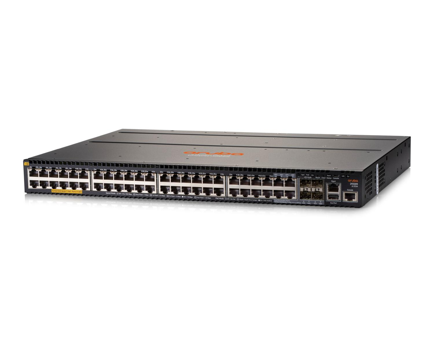 A black Aruba network switch with numerous ports on its front panel.