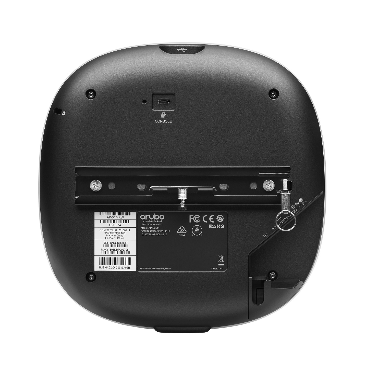 Achterkant van een zwarte Aruba Wi-Fi access point met poorten en labels.