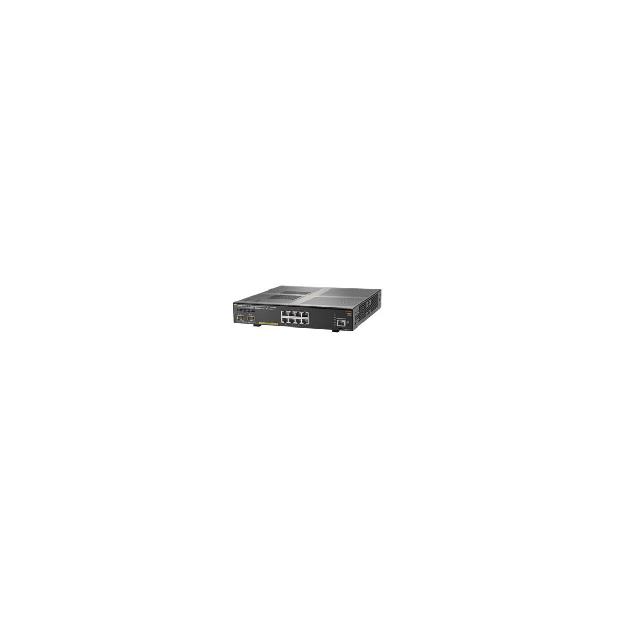 Uno switch di rete grigio con porte frontali.