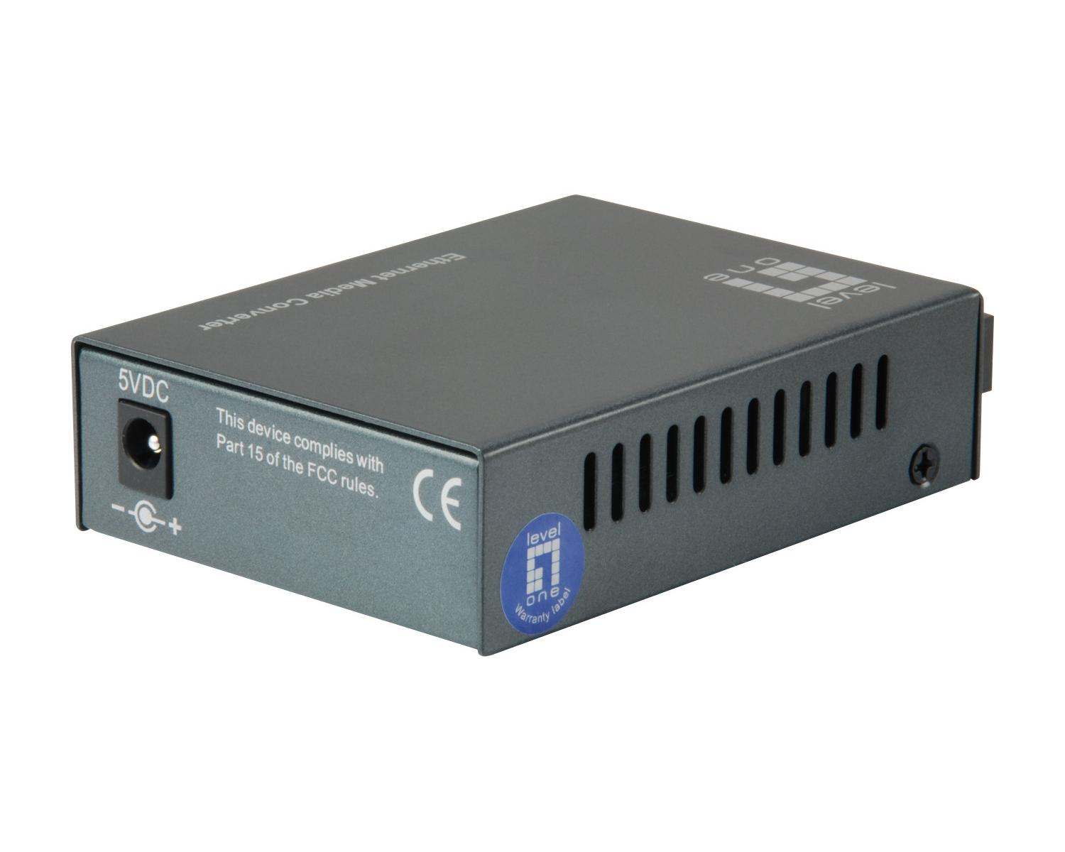 Grijze Ethernet mediaconverter met 5VDC-ingang, FCC-naleving en CE-markering.