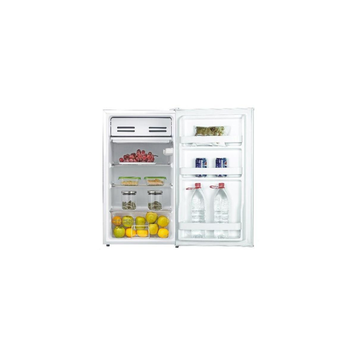 An open refrigerator with fruits, vegetables, and water bottles inside.