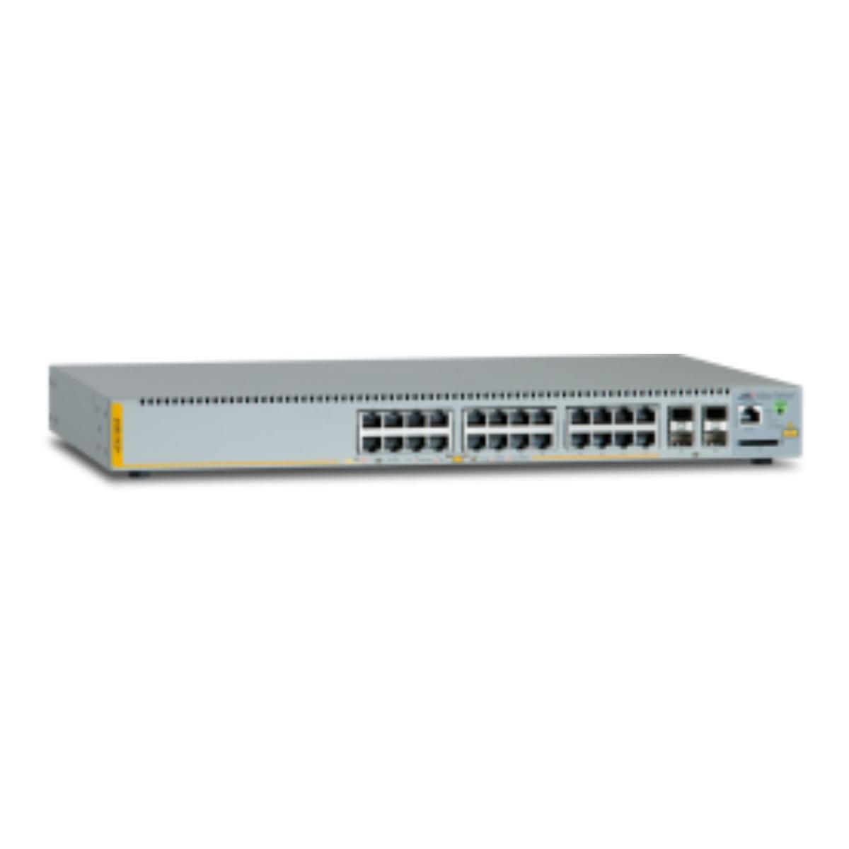 Dispositivo switch di rete grigio con molte porte sul pannello frontale.