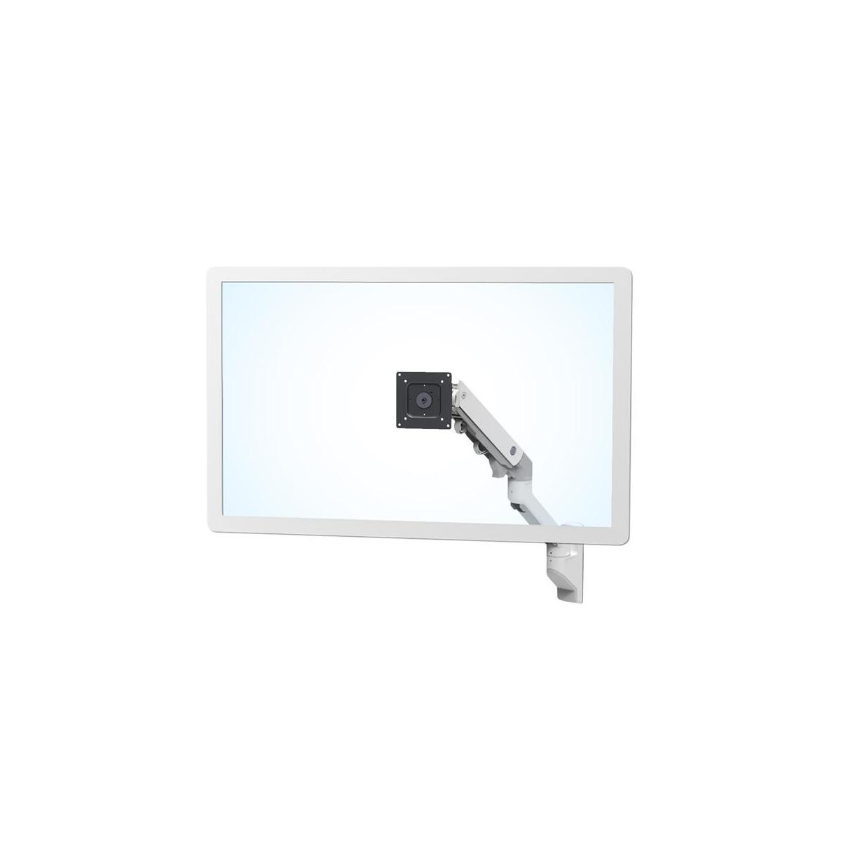 Un moniteur blanc est fixé à un bras blanc flexible monté sur un mur.