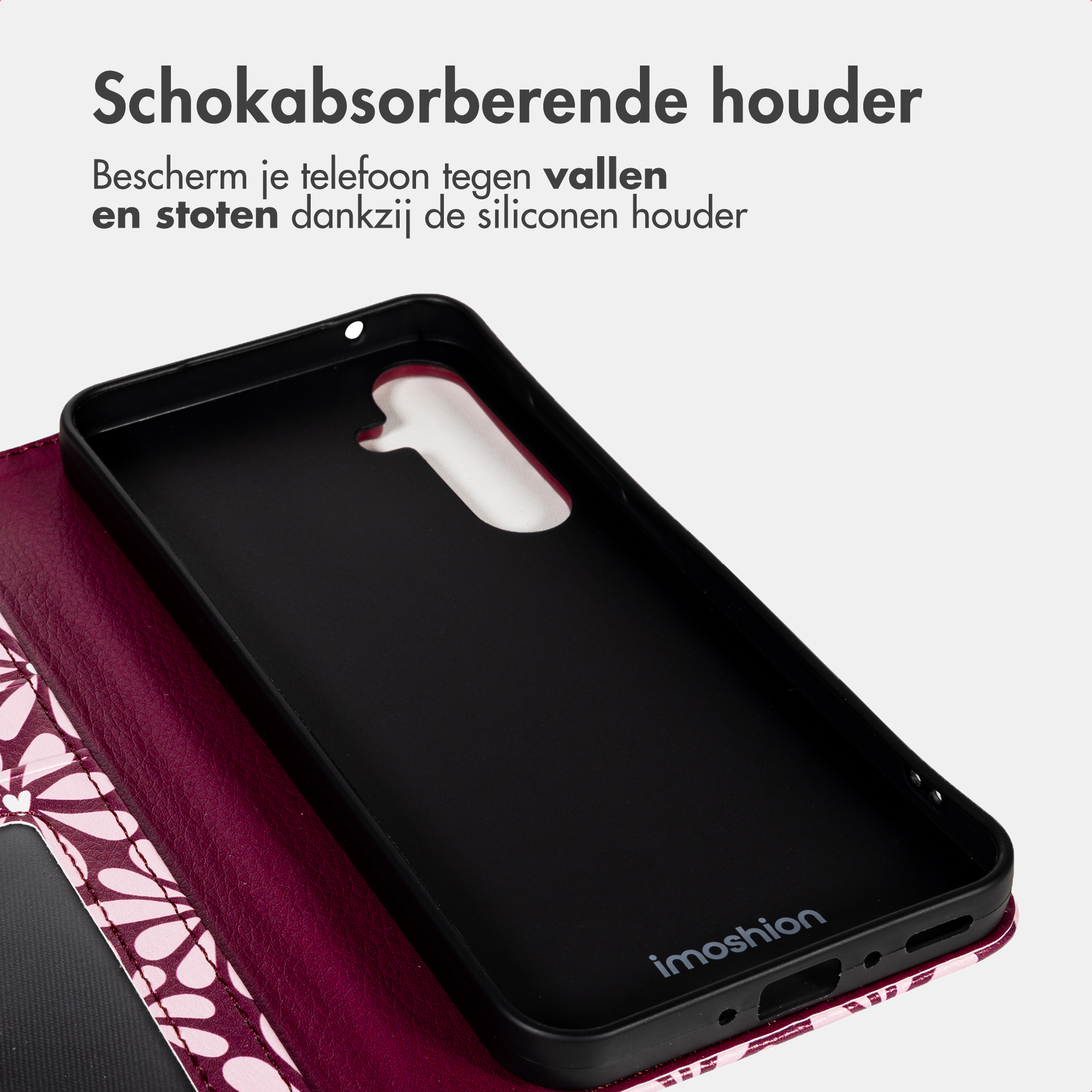 Coque de téléphone noire à motif floral rose et rouge, intérieur noir.